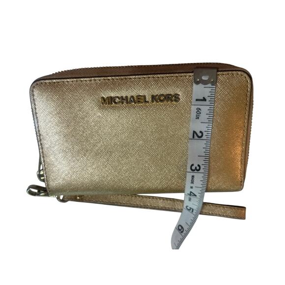 Michael Kors Jet Set Travel Leather Continental Wristlet in a gold metallic - Picture 7 of 7
